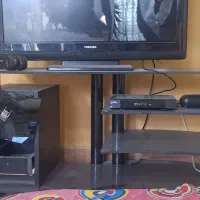 میز تلوزیون شیشه ای کار کرده