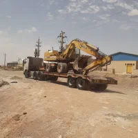 اجاره بیل مکانیکی چرخ لاستیکی