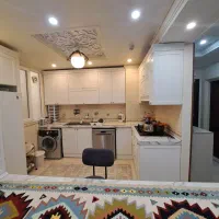 هجرت-105-متر-2خواب-فول-امکانات-سالن-پرده-خور