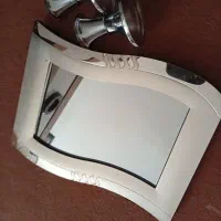 آیینه و شمعدان کوچک