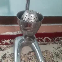 یک دستگاه اب مرکبات گیر استیل اصل.
