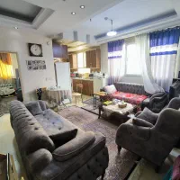 ۵۲متر مالک اشتر/تکواحدی/سالن پرده خور/گذر پهن