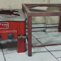 گاز تک شعله به همراه چهار پایه آهنی ۵ میلیون و۲۰۰