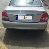 یک دستگاه مزدا سواری 323