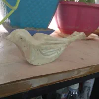 مجسمه دست ساز پرنده ی چوبی