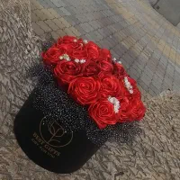 دسته گل و باکس‌های روبانی