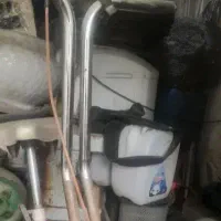 ماشین لباسشویی دوقلو ی سانی و یک دوچرخه ی ثابت