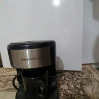 قهوه ساز  با میز تلویزیون