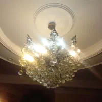 یک عدد لوستر برنجی کریستالی ۸ شاخه ۱۶ لامپی