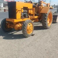 راننده تراکتور لدری بیل عقب