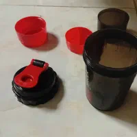قمقمه ورزشکاری همرا پیمانه