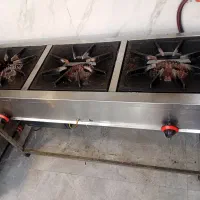 اجاق گاز و سطل زباله و فریزر صندوقی و بن ماری