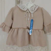 تعدادی لباس  بچگانه