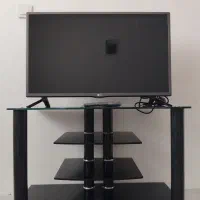 تلویزیون۳۲ اینچ LG به همراه میز تلویزیون