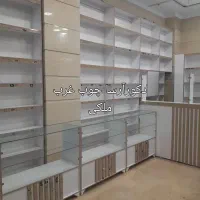 پیشخوان قفسه راش بدلیجات داروخانه کتیبه ای