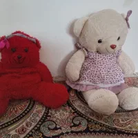 دوعدد عروسک بزرگ وچندتا کوچیک