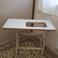 میز‌چرخ‌‌خیاطی‌خانگی