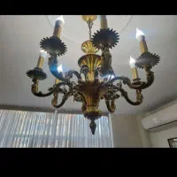 فروشنده و خریدار لوستر برنجی سالم و فرسوده