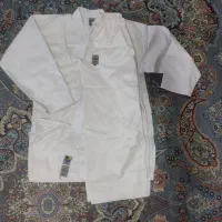 لباس کاراته به همراه دستکش روپایی و ساق بند
