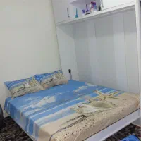 تختخواب تاشو کم جا با خوشخواب و کمد بالا.