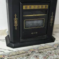 بخاری و میز تلویزیون