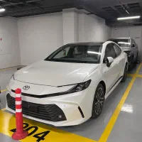 کمری le ژاپن ۲،۵ لیتر هیبرید ۲۰۲۵ داخل چرم