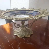 پروانه برنزی با میوه خوری