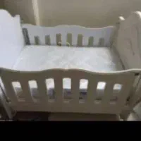 تخت نوزاد گهواره دار