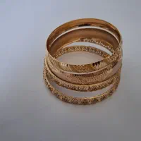 دو تکپوش و دو النگو ۳۳ گرم طلا