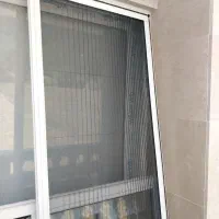 پنجره دو جداره upvc و توری درب تراس