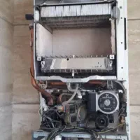 تعمیر و سرویس ونصب  انواع آبگرمکن و پکیج دیواری