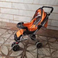 کالسکه با صندلی غذای کودک