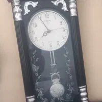 ساعت دیواری آونگ دار