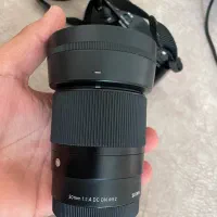 لنز در حد نو ۳۰ سیگما f1.4 dc dn