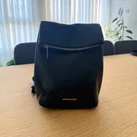 کوله چرم مینی، مارک برشکا