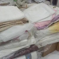حراج پارچه های ته طاقه و دکور مغازه. پرده و کوسن