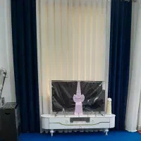 شال سرمه‌ای مخمل و چوب پرده استیل مدل پانچی
