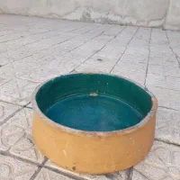 لانجین وکوزه سفالی