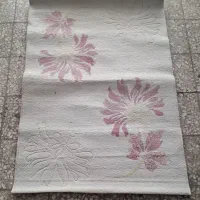 یه تعدادی فرش و موکت