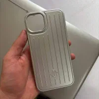 قاب نو آیفون 13 و 14 برند Rimowa نقره‌ای کاملا نو
