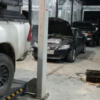 تعمیرگاه خودرو خارجی.گذر.چینی. مکانیک.باطر سازی