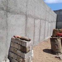 سیمانکاری سیاه سفید اسانسور دیوار پشت کار