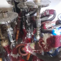 کارگر قهوه خانه کارگر ساده وسط کار قلیان شور