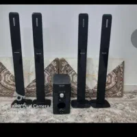 سینما خانواده واسپیکر ایستاده