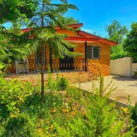 ویلا-باغ-فلت-با-نمای-سنگی-آجری-با-محوطه-دلنشین