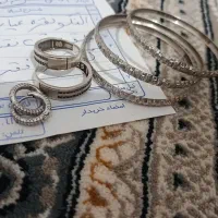 ست حلقه و گوشواره و ۳ عدد النگو نقره کاملا نو
