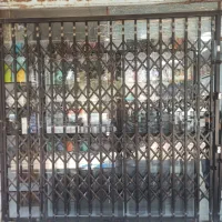 درب آکاردئونی مغازه