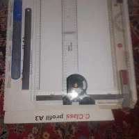 تخته نقشه کشی و خط کش و کیف