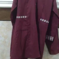 یک دست لباس مدرسه ای با کیف درحد نو