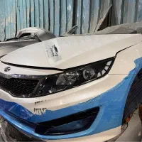 سپر‌کاپوت‌فرمان‌چراغ‌‌جلوپنجره‌ایربگ‌گلگیر اپتیما